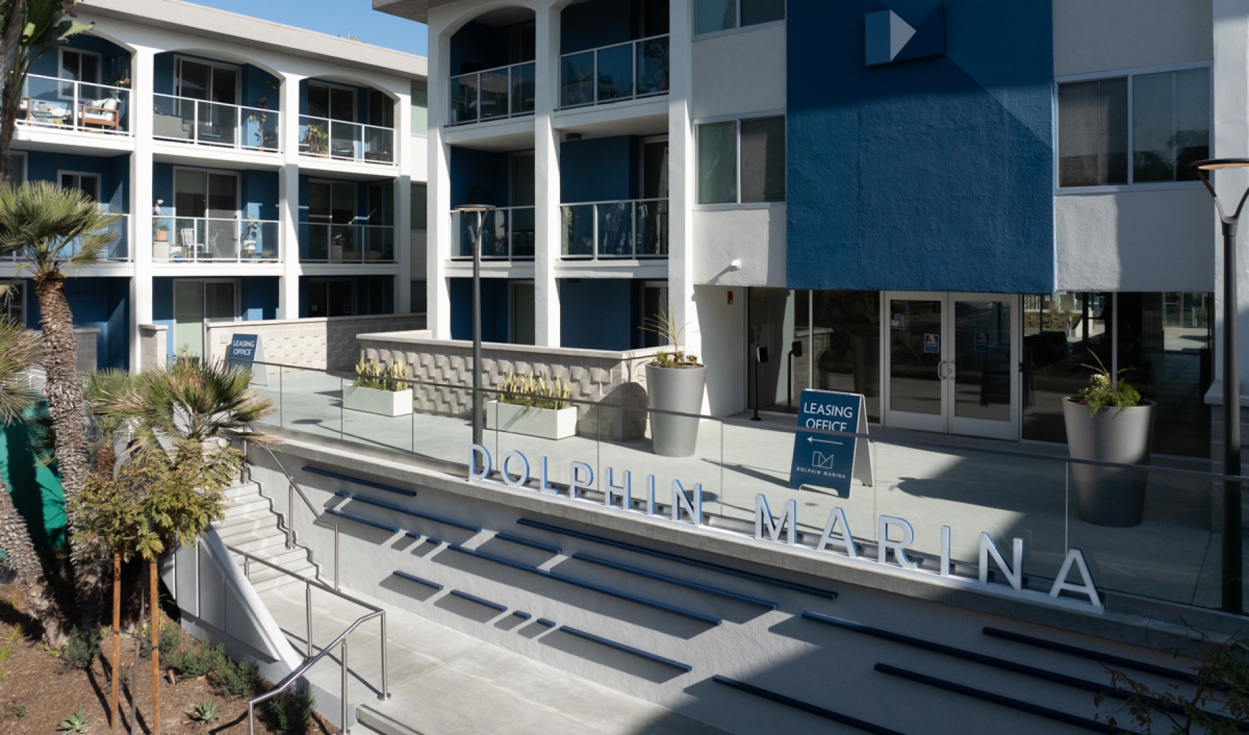 View of the contemporary exterior of Dolphin Marina, Marina Del Rey apartments.