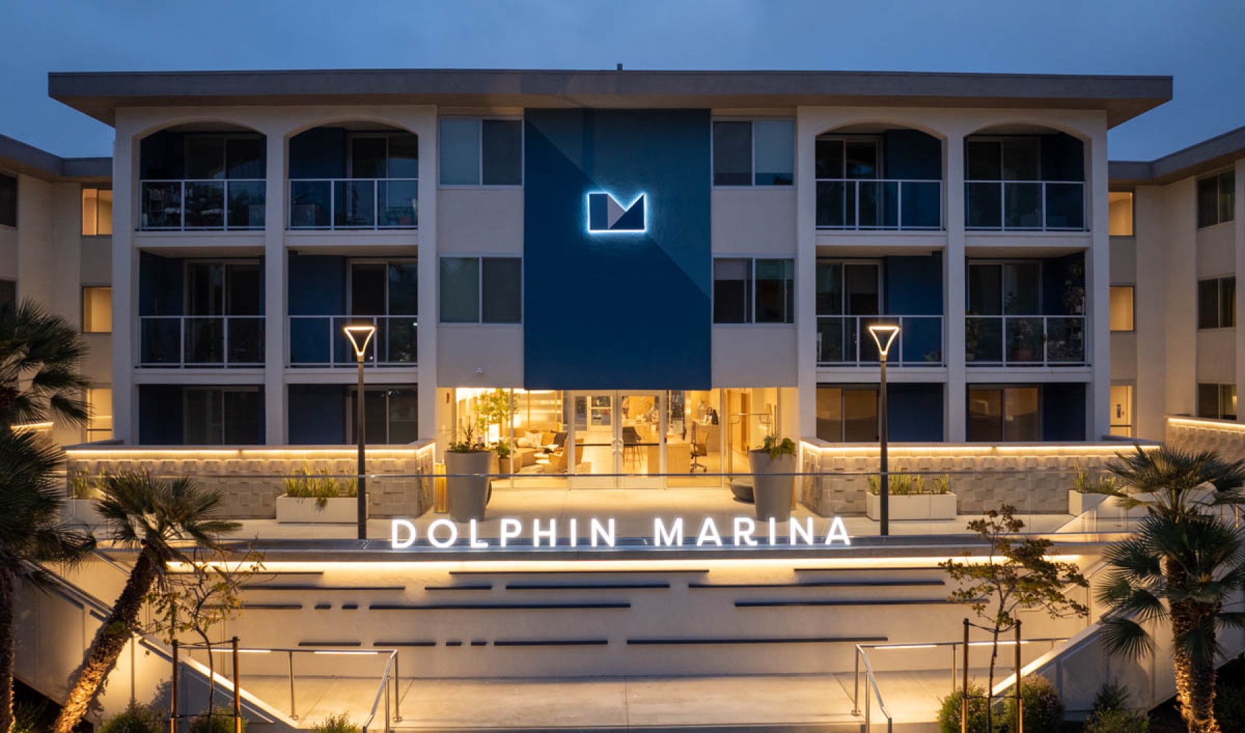 View of the contemporary exterior of Dolphin Marina, Marina Del Rey apartments.