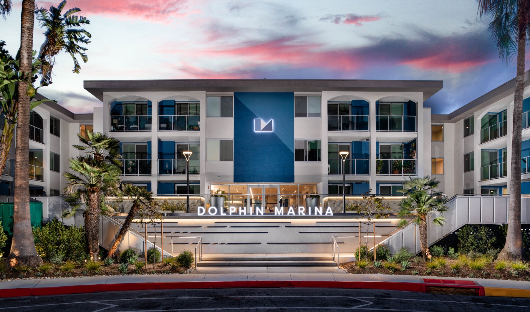 View of the contemporary exterior of Dolphin Marina, Marina Del Rey apartments.