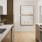 Kitchen cabinets and artwork at Dolphin Marina luxury apartments in Los Angeles